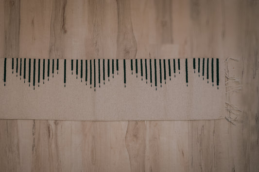 Black vertical line pattern on a beige background